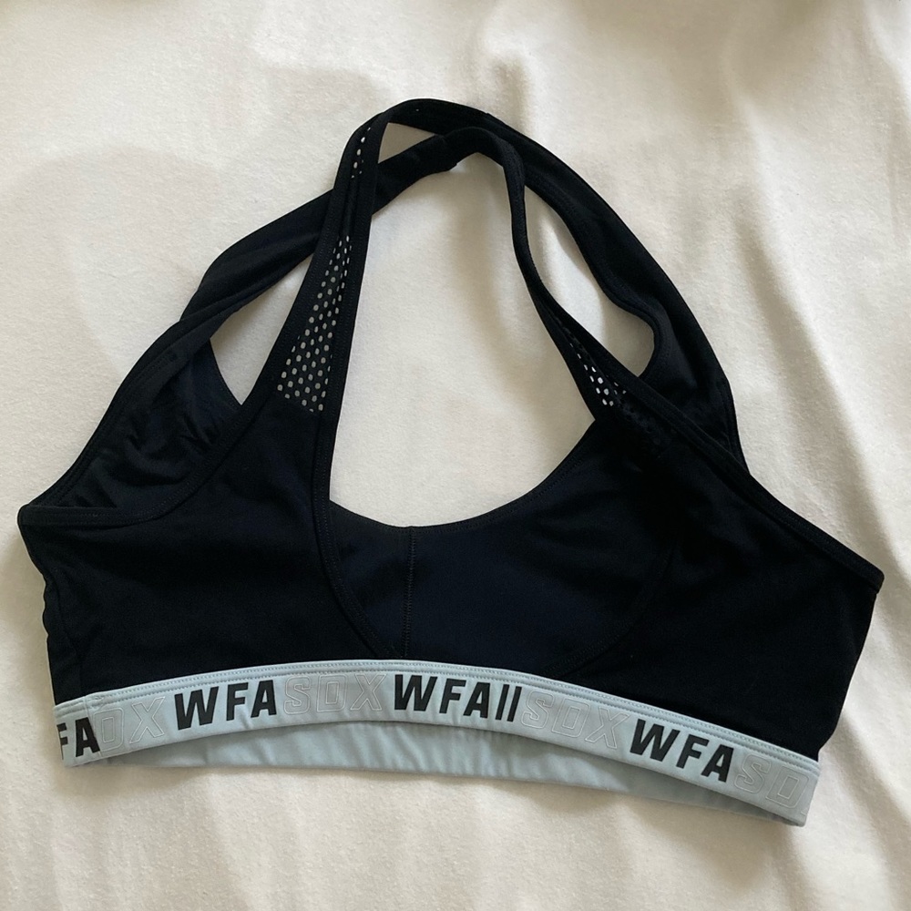 Sarahs day white fox collection. Black and blue racer back sports bra.